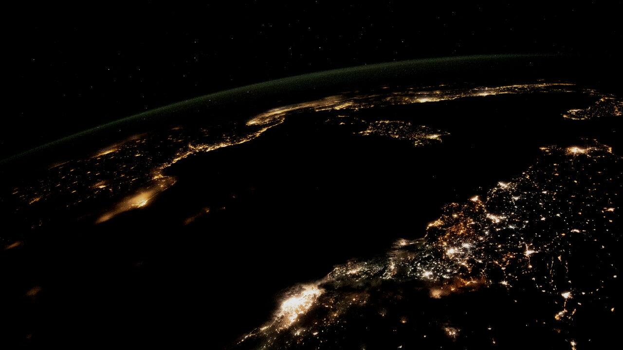 Northern Europe seen at night from the International Space Station, city lights along the Baltic